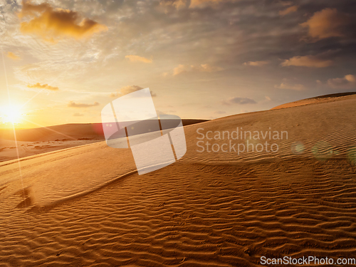 Image of White sand dunes on sunrise, Mui Ne, Vietnam