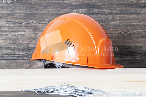 Image of protective orange helmet