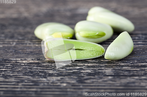 Image of green unripe and soft bean seeds