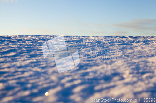 Image of uneven drifts of white snow