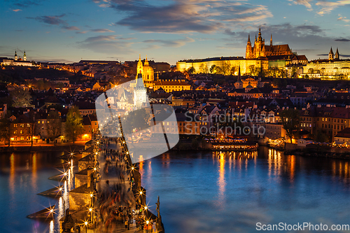 Image of Night view of Prague castle and Charles Bridge over Vltava river