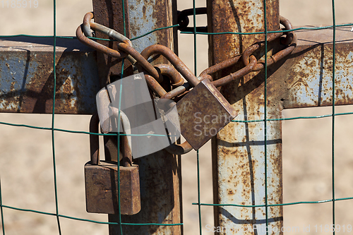 Image of several metal rusted locks