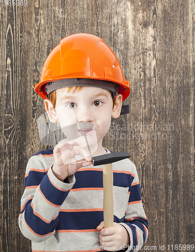 Image of boy in orange helmet