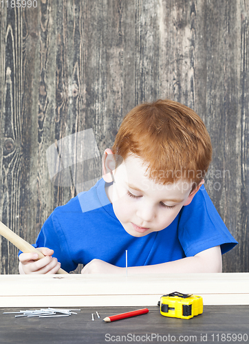 Image of nail in the boards