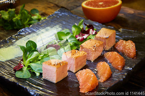 Image of Slow Cooked Salmon fillet steak with salad on plate, Sous-Vide Cooking Salmon Fish