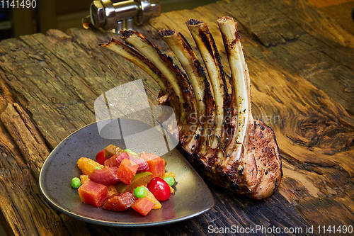 Image of Lamb rack with limoncello glaze served on a plate