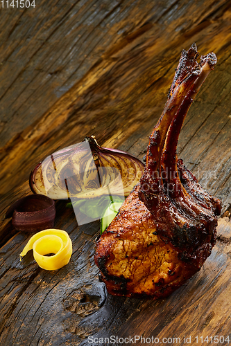 Image of Lamb rack with limoncello glaze served on a plate