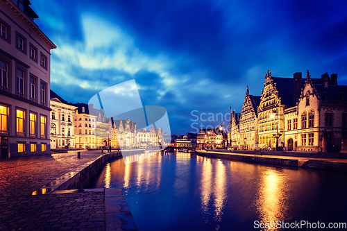 Image of Ghent canal, Graslei and Korenlei streets in the evening. Ghent,