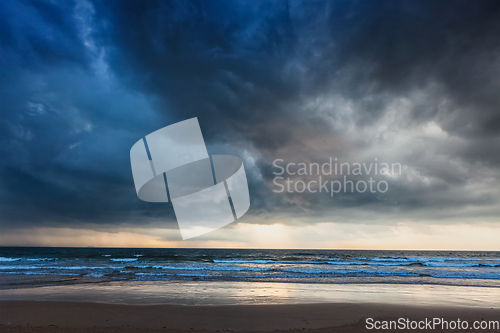 Image of Gathering storm on beach