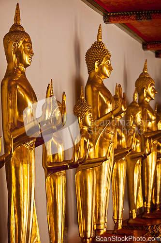 Image of Standing Buddha statues, Thailand