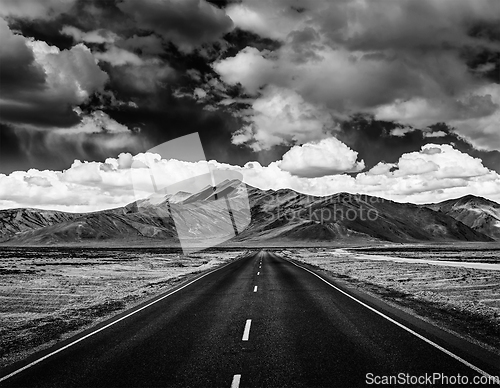 Image of Road on plains in Himalayas with mountains