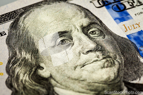 Image of Benjamin Franklin portrait macro shot of 100 bill