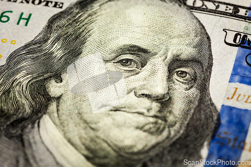 Image of Benjamin Franklin portrait macro shot of 100 bill