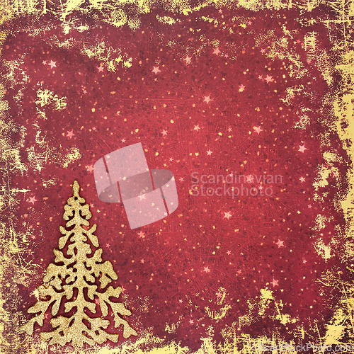 Image of Christmas Tree Glitter Decoration on Grunge Red Gold Background