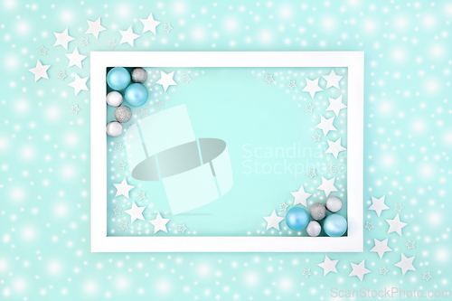 Image of Abstract Christmas Blue Background with Stars Snow and Decoratio