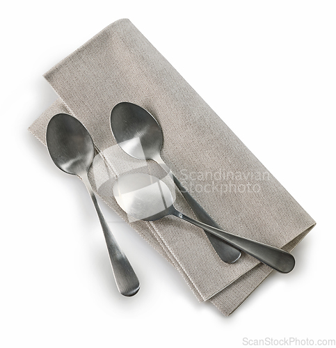 Image of tea spoons and napkin