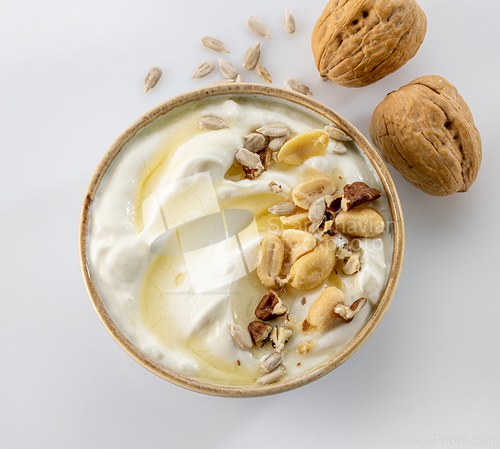 Image of greek yogurt with honey syrup and nuts