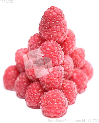 Image of The pyramid of ripe raspberry over white background