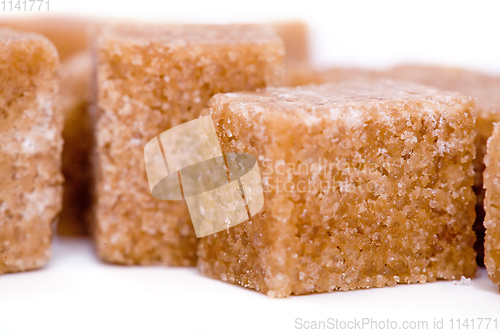 Image of Brown sugar cubes. on white background