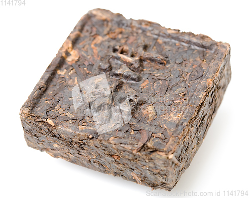 Image of Aromatic black pu-erh tea from yunnan province in China. Leaves undergoes double fermentation and compressed into bricks. Healthy drink.