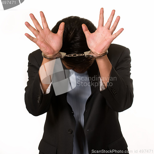 Image of Ashamed man in handcuffs