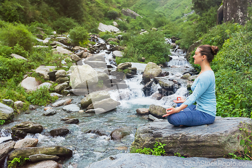 Image of Woman in Padmasana outdoors