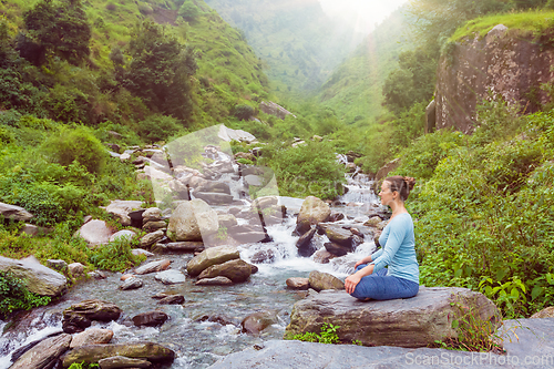 Image of Woman in Padmasana outdoors