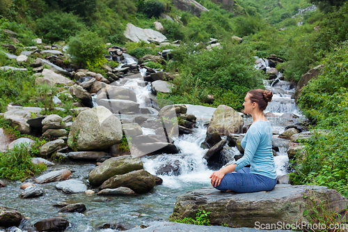 Image of Woman in Padmasana outdoors