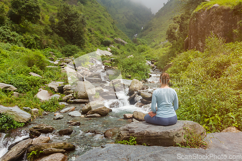 Image of Woman in Padmasana outdoors