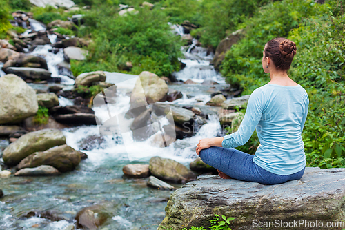 Image of Woman in Padmasana outdoors