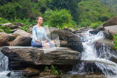 Image of Woman in Padmasana outdoors