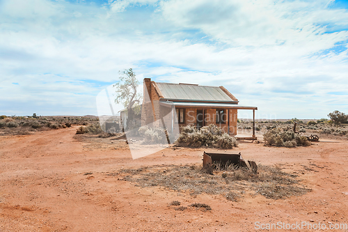 Image of Old stone cottage baking in the hot Australian sun