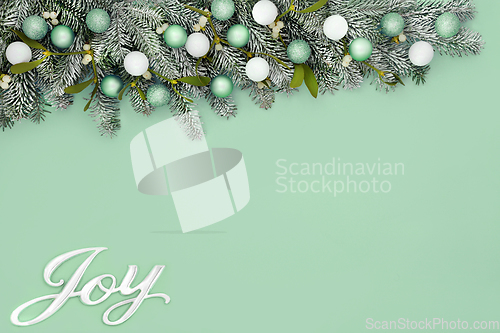 Image of Christmas Joy Abstract Green Background with Tree Decorations