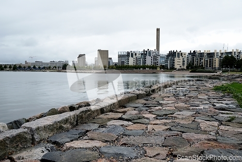 Image of embankment paved with large granite stones in Helsinki