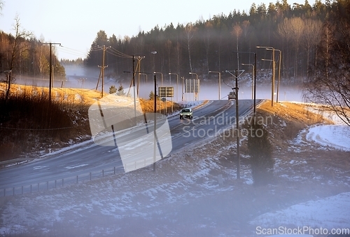 Image of country road in the fog 