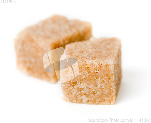 Image of Brown sugar cubes. on white background