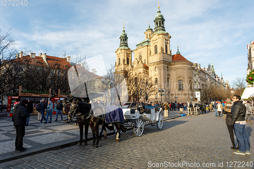 Image of horse carriage waiting for tourists on Christmas Old Town Square