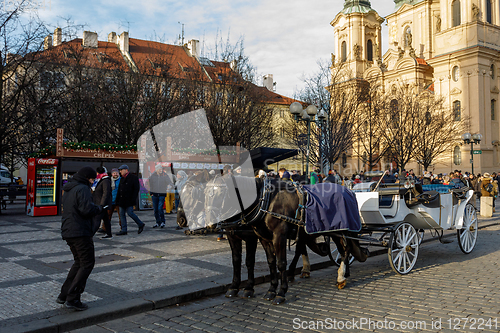 Image of horse carriage waiting for tourists on Christmas Old Town Square
