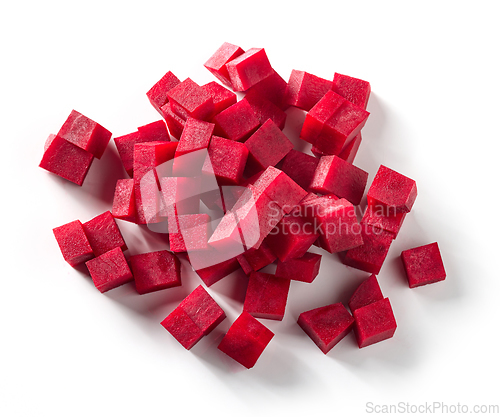 Image of beetroot cubes on white background