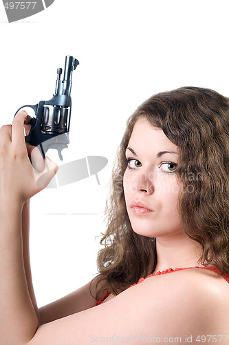 Image of Young woman with a pistol. Isolated on white