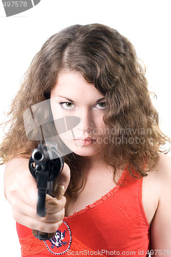 Image of Young woman with a pistol. Isolated on white background