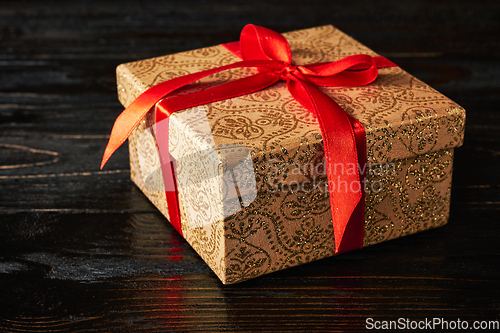 Image of Gift box with red ribbon