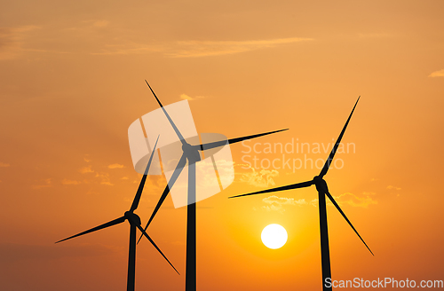 Image of Wind generator turbines in sky