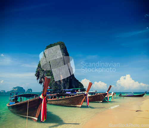 Image of Long tail boat on beach, Thailand