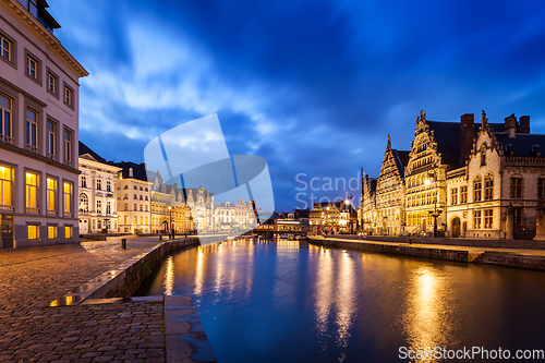 Image of Ghent canal, Graslei and Korenlei streets in the evening. Ghent,