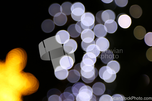 Image of Lights of bulbs, abstract holiday background out of focus