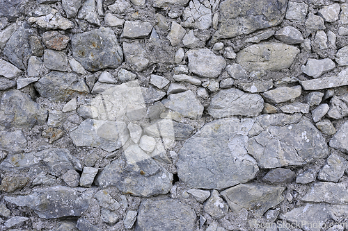 Image of Old wall from stones of various shapes