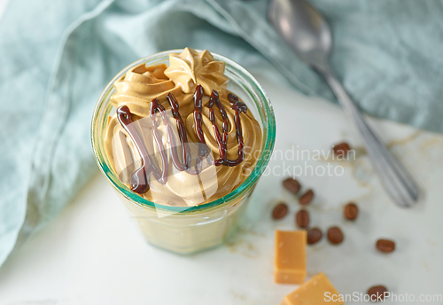 Image of glass of whipped coffee and caramel mousse cream