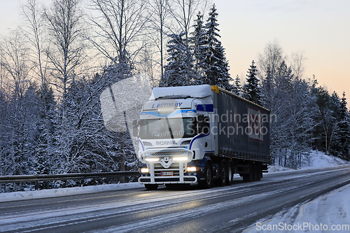 Image of Scania Truck L Retva With Bright Headlights Pulls Semi Trailer 