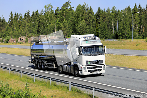 Image of White Volvo FH Truck Semi Tank Trailer on Motorway